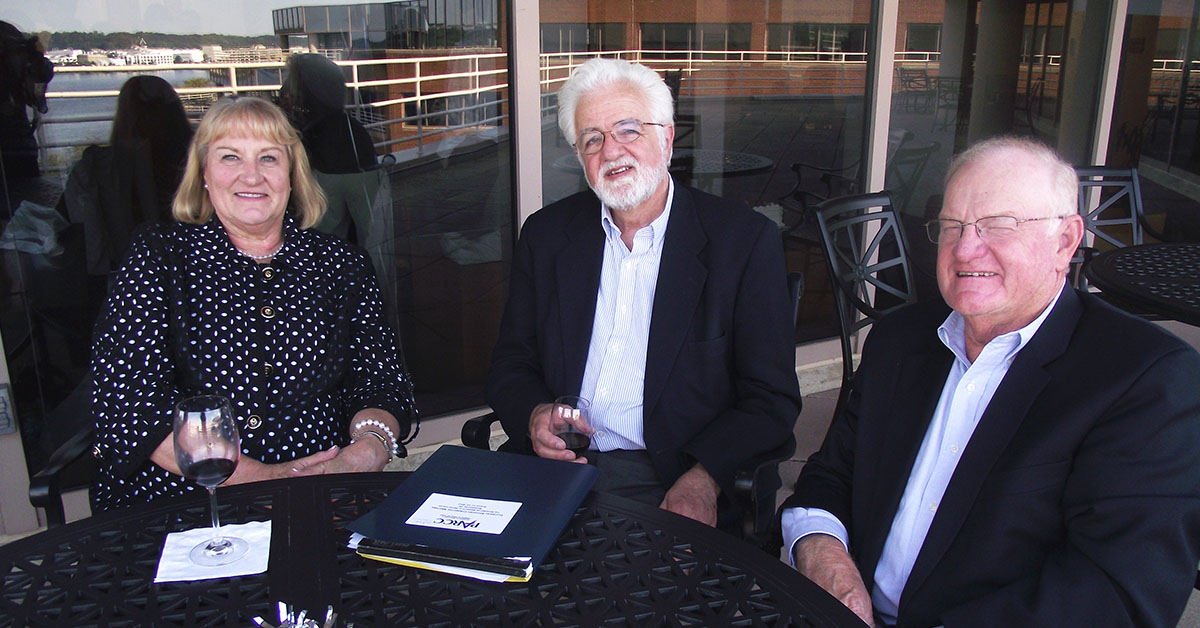 Jack McKay (right), along with his wife Roberta and former HumRRO President Laurie Wise.